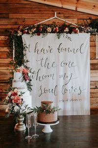 Bible verse enscripted wedding reception tapestry| Image by Melissa Marshall