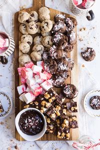 Elevate your yearly cookie platter game with an epic Christmas cookie board! Get the best Christmas cookie recipes, Christmas party ideas, entertaining tips, Christmas cocktails and more from entertaining blog @cydconverse