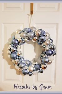 Ornament wreath; christmas aesthetic; winter aesthetic; winter wreaths for front door; winter wreaths after Christmas; blue Christmas decor; christmas balls; shatterproof balls; Christmas Mantel Decor; Christmas entryway decor; Ornament Wreath hanger; Christmas Decorations; Christmas Bulb Wreath; Christmas ball wreath; winter wreath; holiday decor; bauble wreath; winter decor; christmas gifts; holiday gifts; gift for mom; gift for her; office holiday decorations; christmas ornaments; ice blue