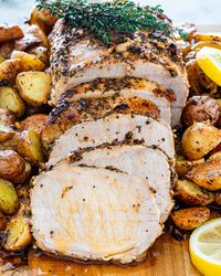 This Lemon Garlic Pork Roast is one of my favorite dishes to make for Sunday night dinners. The marinade, made with lots of garlic and fresh lemon, is incredibly aromatic and the perfect match for creating a restaurant-quality pork loin. #pork #roast #lemon #garlic #recipe