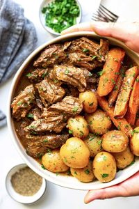 Here's a no-fuss, easy ultimate slow cooker pot roast recipe with fall-apart. tender meat and vegetables in a hearty au just gravy.