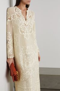 Find VALENTINO Embellished Crocheted Cotton-blend Maxi Dress on Editorialist. Valentino's cotton-blend maxi dress is delicately crocheted with flowers and scrolls. It's finished with the house's gold-toned 'V' at the neckline and breezy enough to wear on warm summer days. Team yours with sandals and a basket bag.