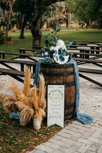 Rustic wedding ceremony decor. Wedding barrels. Dusty blue wedding. Outdoor wedding ceremony. Barn wedding.