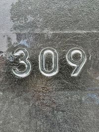 Street Number signage made of glass