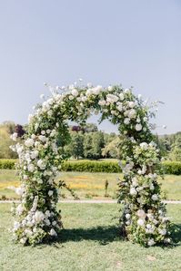 White and green classic and timeless arch for a chateau wedding by Floraison Paris. Peonies, hydrangeas, roses and greenery. Chateau wedding, destination wedding France