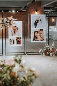 The pre wedding photos printed on a tarpaulin banner and displayed at the wedding entrance with floral décor arrangements.