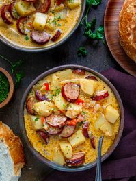 Cajun Potato Soup is made with andouille sausage, potatoes, vegetables, and a blend of Cajun spices, enriched with heavy cream and cheddar cheese for a spicy, creamy, and comforting soup! It's perfect for those looking to satisfy their taste buds with a zesty Cajun twist on a classic potato soup.