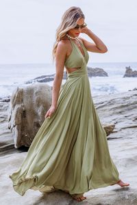 Slip into our Sage Plunging Halter Cutout Maxi Dress for a look that's both stunning and comfortable. Perfect for any occasion, it's a wardrobe essential that effortlessly combines style and ease. Product code: CAA05A4C140RR Features:  Woven Plunging halter neckline Sleeveless Waist cutouts Maxi Wash Method: Regular Wash Material: 100%RAYON.