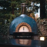 Become the Hostess with the mostest: Forno Piombo custom built wood fired brick oven.