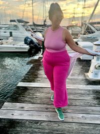 This is a 🛍️Shoppable🛍️ Pin!    Lounge outfit, causal outfit, everyday outfit, errands outfit, monochromatic outfit Pink lounge capri pants, pink tank top, green and pink adidas gazelles, green checkered bag midsize, curvy, outfit, idea, inspo, inspiration, outfit of the day, ootd, midsize ootd, curvy ootd, midsize outfit, curvy outfit, size 12, size 14, size 16, size18  #ootd #outfitoftheday #outdoor #monochromatic #adidas #womenswear #womensstyle