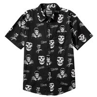 This scary-cool Hawaiian shirt shows off the Misfits’ famous punk rock skull mascot all over! His spooky face and skeleton body cover the black and white shirt, making a monster pattern. The skull’s grinning mouth and empty eyes fit the band’s music about monsters and sci-fi. Wearing this punk rock skull design on a tropical...