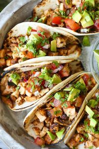 Easy Chicken Tacos - With a simple spice rub, the chicken is cooked so quickly on the stovetop! Dice into small pieces and serve with pico, avocado + lime!