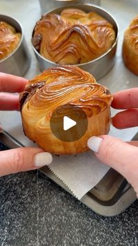 Natalya Syanova on Instagram: "Laminated buns, like those found in French bakeries, can be made at home 😉  Use the croissant dough recipe from my website. Do 1 double and 1 single fold, then roll the dough to 8 mm thick square with sides measuring 20x20 cm. Cut it into 1-inch strips, fold, place, and proof inside an 8 cm baking ring. Bake as usual.   Find the detailed recipe on my website; the link is in my bio ⬆️⬆️⬆️  FOLLOW @natashas_baking for more creative ideas.  #croissant #lamination #viennoiseries #frenchbreakfast #frenchfood #chicagofood #yummy #foodie #explorepage #creator #bakewithme #homebaker #bakerslife #bakersfield"