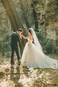 Fairy Tale Moment with the Bride and Groom | Kristin Booth Photography | https://heyweddinglady.com/enchanting-mountain-bridal-portraits/