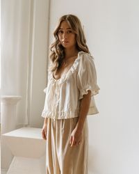 This dainty blouse makes everyday tasks feel special. the power of clothing is truly magical.    details    - 100% organic cotton  - we embrace the slight sheerness of this blouse by wearing a nude or white bra underneath  - its value is in all the handmade details    care    - hand wash (or machine wash on delicate cycle) in cold water and hang dry  - you can use the dryer if you want to soften this fabric quicker    garment measurements    - ﻿as always with combined sizing we still recommend t