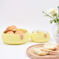 Brighten up your Easter table with these gorgeous and stylish bread baskets. The baskets are crocheted from lovely Hobbii Ribbon and decorated with a leather strap to give them that little extra. Enjoy :-)