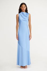 Crafted with the event season in mind, the Lana Maxi Dress in Sky is a stand out. This statement silhouette features a high neck design with a subtle cowl neck and open back feature with adjustable ties. A great option for bridesmaids, pair with a simple heel for a complete look. PRODUCT DETAILS - Maxi dress - Invisible back zip - Soft cowl neckline - Back tie detail - Unlined Composition: 62% Viscose Rayon, 38% Polyester CARE INSTRUCTIONS This fabric has been specially woven. Because of its delicate design and characteristics, please remove all jewellery when dressing.