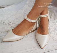 Classically beautiful, our 'DESIRE' showcases double-strand pearl bracelets that tie around the ankles with satin ribbons for an eternally elegant look on your wedding day. These D'Orsay flats are crafted from high quality materials and they feature a stylish pointed-toe and a lightly cushioned leather insole. Heel height: 1cm ( 0.39"). We fully guarantee and stand by our handmade shoes, for their quality and durability. ~ The antiskid rubber sole provides stability and long hours of comfortable