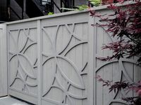 If you heard the words “gray privacy fence” you might think that sounds sort of boring. But if you were talking about this fence, you’d be totally mistaken. These floral-patterned panels take this backyard barrier up a notch with style and elegance.