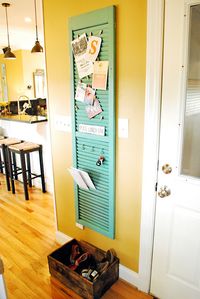 shutter for kitchen - clothespins for invites and hooks for keys!