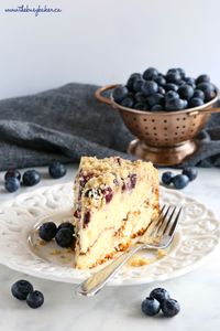 This Best Ever Blueberry Ricotta Coffee Cake is the perfect moist and fluffy coffee cake made with low fat ricotta, and packed with fresh blueberries, cinnamon sugar, and the best crispy streusel topping! Recipe from thebusybaker.ca! #bestcoffeecake #easycoffeecake #blueberrycake