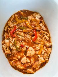 This Easy Crockpot Slow Cooker Chicken Fajitas recipe is made with tender, juicy chicken, peppers, onions, and homemade seasoning. Serve these on warm tortillas with your favorite toppings.