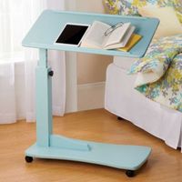 Simply glide the Adjustable Bedside Table under your bed to comfortably eat, read, or watch movies on your laptop.