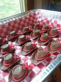 Cowboy Hats: Chocolate dipped Pringles potato chips + Rolo + Red Licorice . . . on red/white checked napkin.   How to make a Chocolate Cowboy Hats