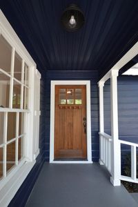 craftsman wood front door | front porch | fixer upper house flip before and after renovation