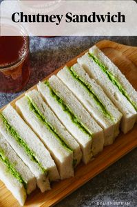 This pleasing Chutney Sandwich is one of the easiest one can ever make. You simply need bread, butter and green chutney to make these amazing sandwiches. The green chutney is super delicious and prepared with handful ingredients. It has nutty taste of coconut with slight spiciness and hint of sweet and tangy taste from sugar and tamarind respectively. Spread generous amount of butter and chutney on soft bread slices and club them together; its that simple !!