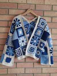 🌸Completely handmade, warm, and uniquely designed, this kimono-style cardigan features a patchwork of various patterns in shades of blue and white. ready to be shipped, suitable for year-round use. ✔ Blue Cardigan: Length 22 inches (56 cm), Sleeve 17 inches (43 cm), Width 44 inches (110 cm) S-M 📩  If you desire changes in color or size, please reach out to me.  I would be delighted to collaborate with you.  ✈ Shipping is generally free and done via DHL or express delivery. 📍 It is easy to clean,  To ensure the longevity of your product, please wash it at a low temperature and dry it flat.  😊 I find joy in connecting with different cultures and lifestyles on the world's meeting point for shopping.  Thank you.🌸