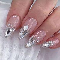 #CoffinNailsWithDiamonds #GlamNails #DiamondNails #ElegantNailDesign #SparklingNails #LuxuryNails #BlingNails #NailArtWithDiamonds #CoffinNailArt #FancyNails