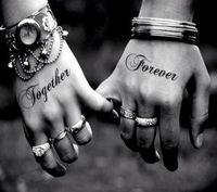 A really cute and meaningful couple tattoo. This is probably one of the most popular types of couple tattoos wherein words are inked on couples. You can use your favorite words or phrases and ink them separately to show how perfect they look when combined together