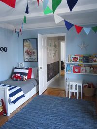 toddler room! Love the chalkboard wall for the kids outside the bedroom! A must in our new place