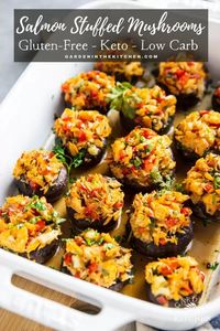 These keto and gluten free Salmon Stuffed Mushrooms are overflowing with good stuff! The old bay and parsley-seasoned salmon, cauliflower rice, and bell pepper filling makes every bite taste light, fresh, and healthy.