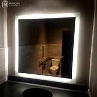 A gorgeous example of how much class a side-lighted rectangular LED vanity mirror can bring to any commercial bathroom. This 44" by 44" mirror was put into a remodeled bathroom, and it's the perfect addition to the ambiance of the business. Thank you to Jonathan, in Columbus, IN, for sharing this design with us!