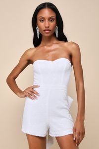 You'll have everyone convinced they're in love with you when you show up in the Lulus Dazzling Muse White Sequin Bow Strapless Romper! Sparkling white sequins cover sheer mesh as it shapes this glamorous little romper with a sweetheart neckline (with hidden no-slip strips) and a strapless, princess-seamed bodice (with side boning). The high, banded waist continues into flirty shorts. Turn around to reveal an oversized, detachable bow (with snap closures) that creates an iconic finish! Hidden bac