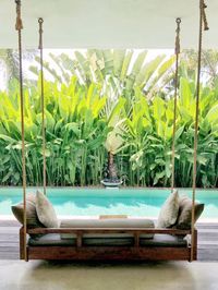 Hanging sofa overlooking the pool