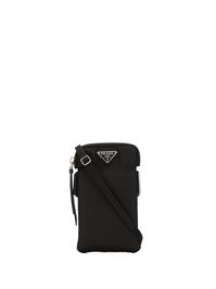 Black logo plaque phone pouch from PRADA featuring enamel triangle logo, top zip fastening and adjustable neck strap.