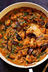 Rich, flavor-packed tofu eggplant curry is an easy weeknight meal that comes together in one pan! This saucy mix of crispy eggplant and tofu is delicious served over naan, flatbread, or rice.