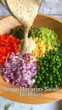 25min · 6 servings     Ingredients:  • 16 ounces elbow macaroni   • 1 ½ cups frozen green peas  • 5 ribs celery, small dice  • 1 large bell pepper, small dice  • 8 to 10 sweet pickles, chopped (optional)  • ½ medium red onion, small dice (about ¾ cup)  • ¼ cup dill leaves, chopped  For the creamy oil-free, mayo-free dressing:  • ¾ cup raw almonds  • 2 tablespoons pickle juice  • ¼ cup Dijon mustard  • 1 teaspoon onion powder  • ¼ teaspoon mustard powder  • ¼ cup whole grain mustard   • Salt to taste  https://cookingforpeanuts.com/vegan-macaroni-salad-with-peas-no-mayo/