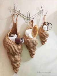 How about some fun crochet shells as little bathroom storage baskets!? If you love to crochet, check them out along with other coastal theme crochet ideas, all featured on completely-coastal.com