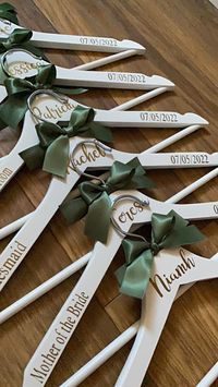 Beautiful personalised wedding hangers, perfect for any wedding day. They are lovely gifts that can be given to the bride/bridesmaid/maid of honour/mother and father of the bride and groom/flower girls/groom/grooms men/usher and page boy. Each hanger can be personalised with your chosen vinyl colour and ribbon. Vinyl colours are black, gold, rose gold or silver. If you require a different colour please message me and I will try to accommodate you. All hangers are the same standard size.