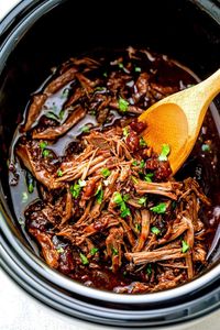 The key to this slow cooker Asian pulled pork is the marinade. For the best taste and texture, it needs a few hours in the sauce before cooking low and slow.