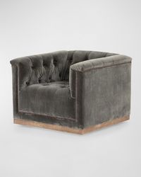 A modern take on the classic library chair, the Maxx Swivel Chair is upholstered in distressed velvet with subtle highs and lows that change in appearance depending on the direction of the fabric's nap and the lighting in the room. It's mounted on a 360degree swivel base and finished with aged bronze nailheads.    Handcrafted of engineered hardwood and polyester    Overall, approx. 33.5"W x 33.75"D x 26"T    Seat, 20.5"W x 25"D x 16"T    Arm height, 26"    Finished back    Weight, 77.0 lbs    Im