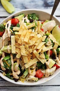 Taco salad is a perfect way to use up leftover turkey! Top it with all of your favorites like black beans, avocado, corn, cheese, tortilla strips, and your favorite southwest dressing!