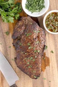 Savor the comfort of a home-cooked meal with our London broil in oven recipe! Transform a tough cut of beef into a tender, juicy roast dinner that's bursting with flavor. Marinated and perfectly paired with creamy mashed potatoes and zesty chimichurri!