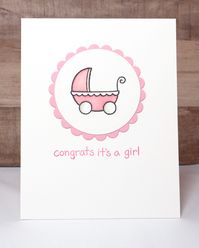 "Celebrate a new baby girl with this handmade girl baby card. The card features a stamped pink carriage, which was colored in with alcohol markers. The sentiment reads \"Congrats It's a girl.\" The card measures 4 1/4 by 5 1/2 in. and includes a white envelope. The inside of the card is blank for your personalized message. Thanks so much for shopping!"