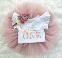 ♥ Some Bunny is One Tutu Set ♥  This sweet Tutu set is sure to be a special addition to your little one's wardrobe. It's perfect for cake smash photos! This tutu is ultra fluffy! Bodysuit has 3 snap closure. The headband is soft and stretchy. Your choice of a flutter sleeve bodysuit or standard.  ORDER TRACKING All orders shipped to the US include tracking. The free shipping option for this item within Canada does not offer tracking. If that is a feature you require please contact me BEFORE orde