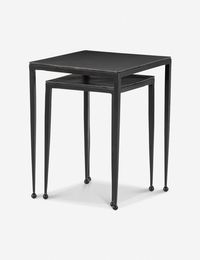 Bristling with character in a streamlined design, these nesting end tables offer a versatile surface area for a dynamic space. This set features a two scaled side tables that can seamlessly nest together or styled apart. The black-finished knobbed feet and squared aluminum top offer an irresistible raw, textural appeal.